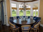 Design of a kitchen-living room with a bay window: photo review
