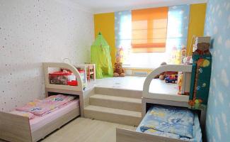 Dizajn dječje sobe 12 m2 za dvije djevojčice