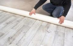 Cum să așezi linoleum pe o podea de lemn: întrebări frecvente de instalare