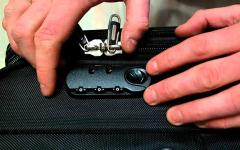 How to set a code on a suitcase lock - detailed instructions